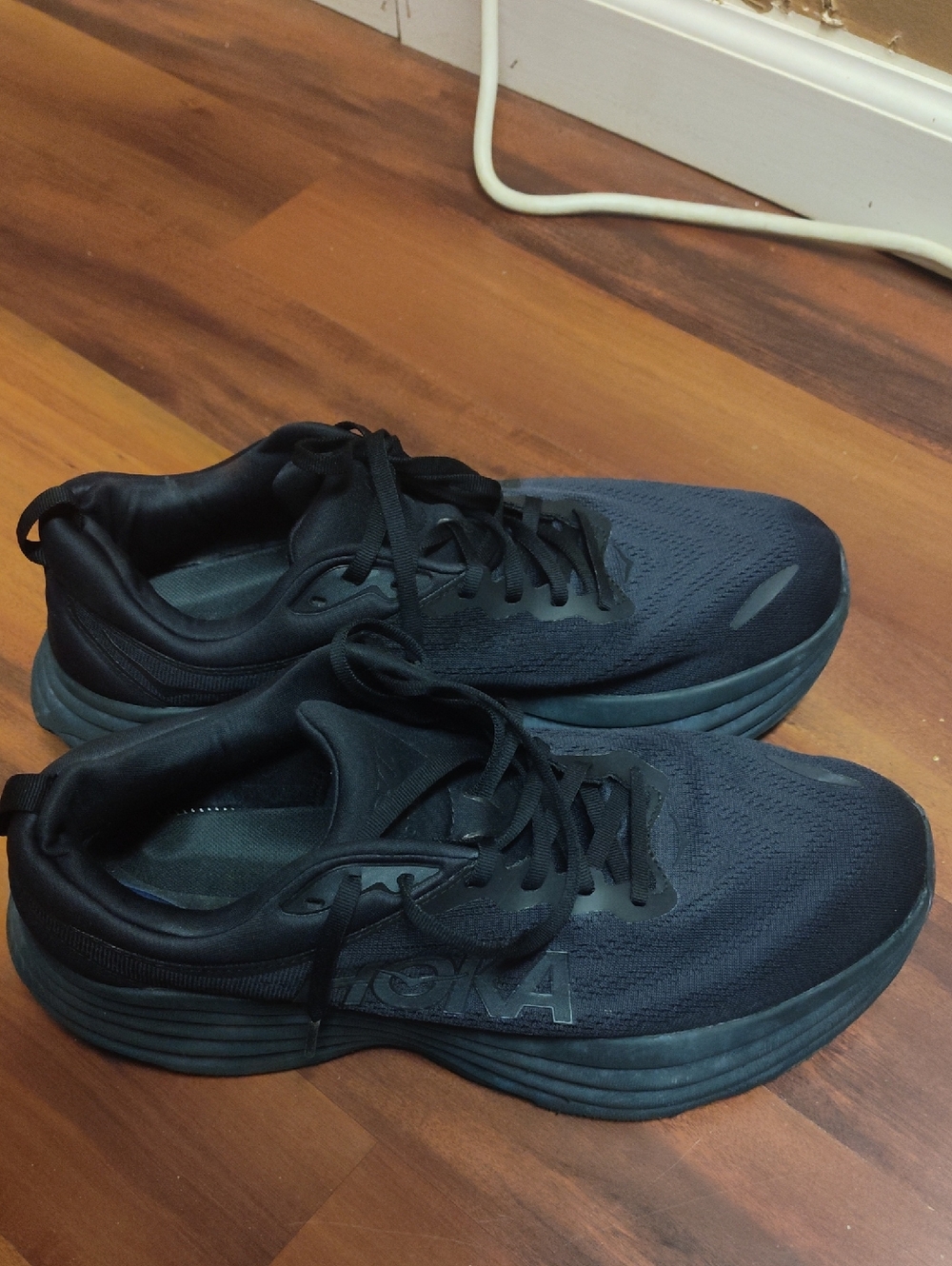 Hoka Men's Black Sneakers with Low-Profile Design
